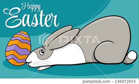 funny cartoon Easter Bunny with colored egg greeting card 136972653