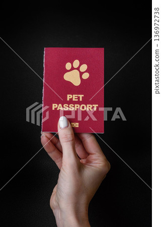 A pet passport is a document for a cat, dog, or other animal. A pet passport 136972738