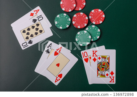 Casino, cards and chips on a colored background, poker and blackjack, gambling. Cards and chips Casino, cards and chips on a colored background, poker and blackjack, gambling. Cards and chips 136972898