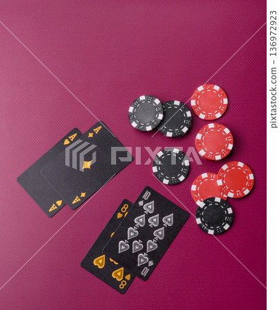 Casino, cards and chips on a colored background, poker and blackjack, gambling. Cards and chips 136972923