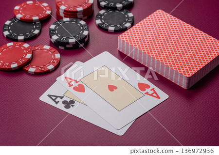 Casino, cards and chips on a colored background, poker and blackjack, gambling. Cards and chips Casino, cards and chips on a colored background, poker and blackjack, gambling. Cards and chips 136972936