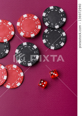 Casino dice and chips on a colored background, poker, gambling with bets. Dice and chips Casino dice and chips on a colored background, poker, gambling with bets. Dice and chips 136972940