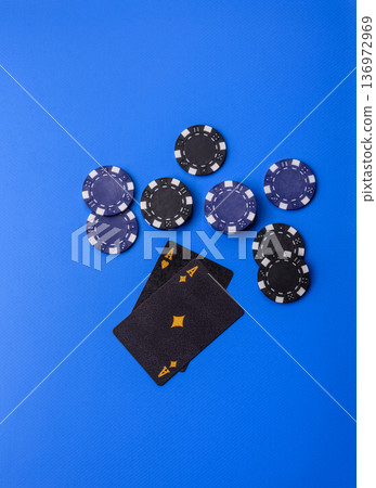 Casino, cards and chips on a colored background, poker and blackjack, gambling. Cards and chips Casino, cards and chips on a colored background, poker and blackjack, gambling. Cards and chips 136972969