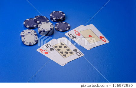 Casino, cards and chips on a colored background, poker and blackjack, gambling. Cards and chips Casino, cards and chips on a colored background, poker and blackjack, gambling. Cards and chips 136972980