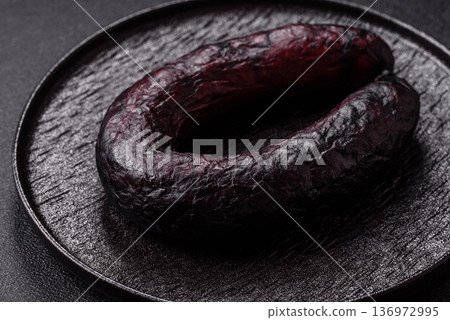 Homemade pork or beef sausage rings with garlic and spices. A homemade sausage ring Homemade pork or beef sausage rings with garlic and spices. A homemade sausage ring 136972995
