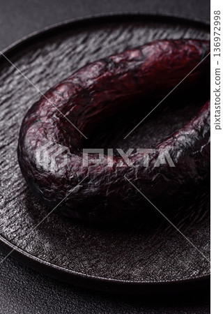 Homemade pork or beef sausage rings with garlic and spices. A homemade sausage ring 136972998