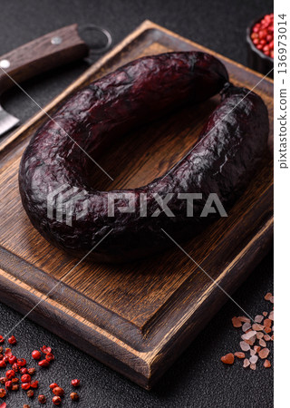 Homemade pork or beef sausage rings with garlic and spices. A homemade sausage ring 136973014