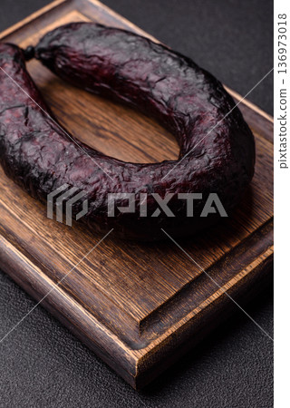 Homemade pork or beef sausage rings with garlic and spices. A homemade sausage ring Homemade pork or beef sausage rings with garlic and spices. A homemade sausage ring 136973018