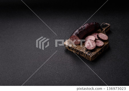 Homemade pork or beef sausage rings with garlic and spices. A homemade sausage ring Homemade pork or beef sausage rings with garlic and spices. A homemade sausage ring 136973023