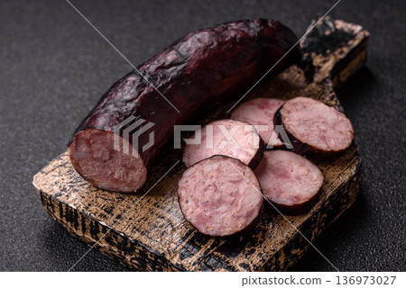 Homemade pork or beef sausage rings with garlic and spices. A homemade sausage ring Homemade pork or beef sausage rings with garlic and spices. A homemade sausage ring 136973027
