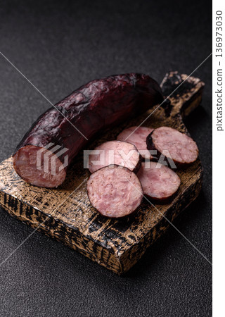 Homemade pork or beef sausage rings with garlic and spices. A homemade sausage ring Homemade pork or beef sausage rings with garlic and spices. A homemade sausage ring 136973030