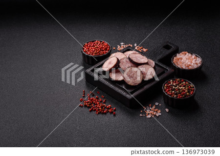 Homemade pork or beef sausage rings with garlic and spices. A homemade sausage ring 136973039