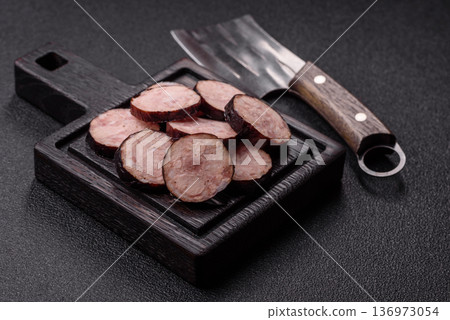 Homemade pork or beef sausage rings with garlic and spices. A homemade sausage ring 136973054