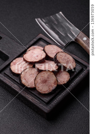 Homemade pork or beef sausage rings with garlic and spices. A homemade sausage ring Homemade pork or beef sausage rings with garlic and spices. A homemade sausage ring 136973059