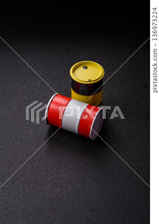 Metal barrels containing oil, gas, or chemicals, global fuel prices, and trends. Oil barrels Metal barrels containing oil, gas, or chemicals, global fuel prices, and trends. Oil barrels 136973224
