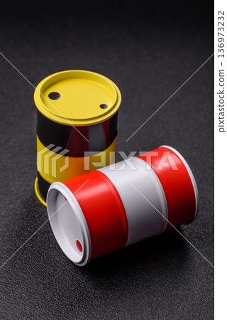 Metal barrels containing oil, gas, or chemicals, global fuel prices, and trends. Oil barrels Metal barrels containing oil, gas, or chemicals, global fuel prices, and trends. Oil barrels 136973232
