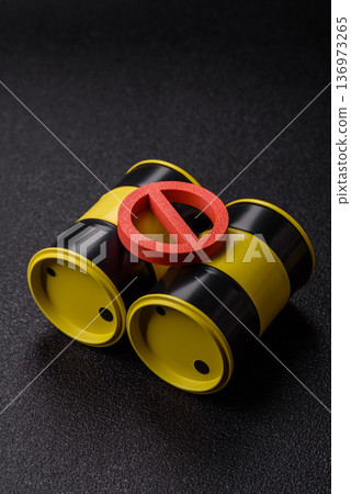Metal barrels containing oil, gas, or chemicals, with a prohibition sign. Oil barrels 136973265