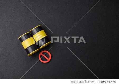 Metal barrels containing oil, gas, or chemicals, with a prohibition sign. Oil barrels 136973270