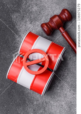 Metal barrels containing oil, gas, or chemicals, with a prohibition sign. Oil barrels 136973279