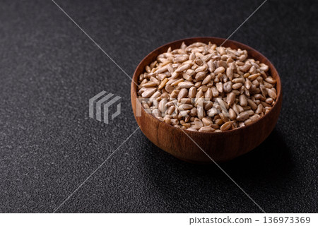 Shelled sunflower seed kernels, salted, roasted, or raw, are a healthy ingredient. Sunflower seeds Shelled sunflower seed kernels, salted, roasted, or raw, are a healthy ingredient. Sunflower seeds 136973369