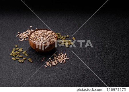 Shelled sunflower seed kernels, salted, roasted, or raw, are a healthy ingredient. Sunflower seeds Shelled sunflower seed kernels, salted, roasted, or raw, are a healthy ingredient. Sunflower seeds 136973375