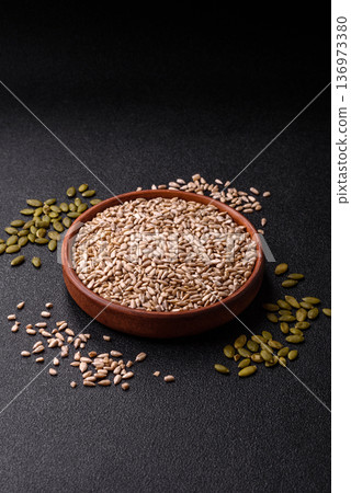 Shelled sunflower seed kernels, salted, roasted, or raw, are a healthy ingredient. Sunflower seeds Shelled sunflower seed kernels, salted, roasted, or raw, are a healthy ingredient. Sunflower seeds 136973380