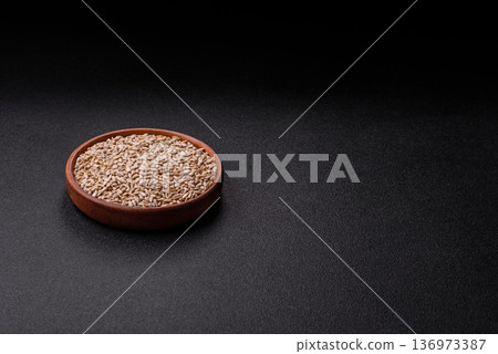 Shelled sunflower seed kernels, salted, roasted, or raw, are a healthy ingredient. Sunflower seeds Shelled sunflower seed kernels, salted, roasted, or raw, are a healthy ingredient. Sunflower seeds 136973387