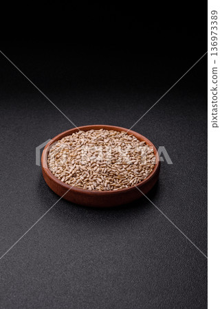 Shelled sunflower seed kernels, salted, roasted, or raw, are a healthy ingredient. Sunflower seeds Shelled sunflower seed kernels, salted, roasted, or raw, are a healthy ingredient. Sunflower seeds 136973389