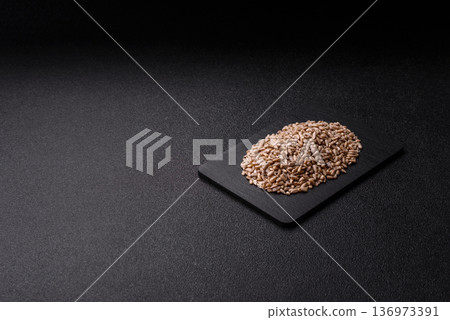 Shelled sunflower seed kernels, salted, roasted, or raw, are a healthy ingredient. Sunflower seeds Shelled sunflower seed kernels, salted, roasted, or raw, are a healthy ingredient. Sunflower seeds 136973391