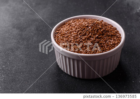 Flaxseed as an ingredient for oil, organic flour, and healthy foods. Flax seeds Flaxseed as an ingredient for oil, organic flour, and healthy foods. Flax seeds 136973585