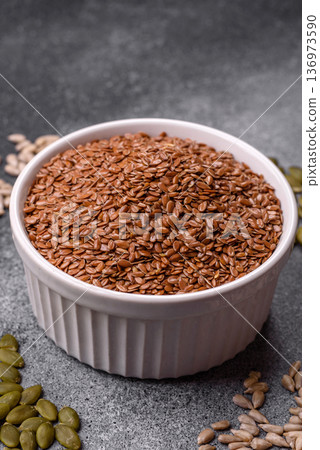 Flaxseed as an ingredient for oil, organic flour, and healthy foods. Flax seeds 136973590