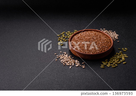 Flaxseed as an ingredient for oil, organic flour, and healthy foods. Flax seeds 136973593