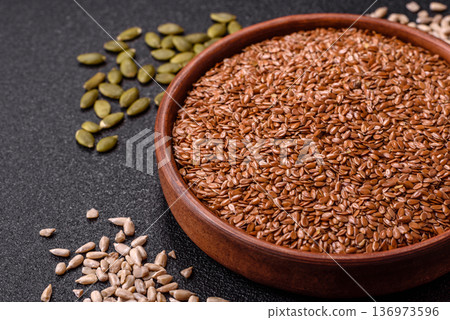 Flaxseed as an ingredient for oil, organic flour, and healthy foods. Flax seeds 136973596