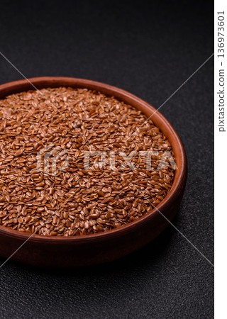 Flaxseed as an ingredient for oil, organic flour, and healthy foods. Flax seeds Flaxseed as an ingredient for oil, organic flour, and healthy foods. Flax seeds 136973601