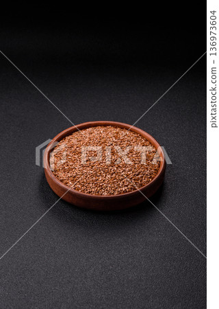 Flaxseed as an ingredient for oil, organic flour, and healthy foods. Flax seeds 136973604