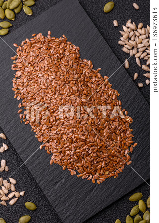 Flaxseed as an ingredient for oil, organic flour, and healthy foods. Flax seeds Flaxseed as an ingredient for oil, organic flour, and healthy foods. Flax seeds 136973613