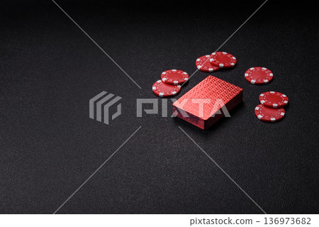 Casino, cards and chips on a colored background, poker and blackjack. Cards and chips Casino, cards and chips on a colored background, poker and blackjack. Cards and chips 136973682