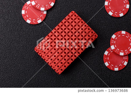 Casino, cards and chips on a colored background, poker and blackjack. Cards and chips Casino, cards and chips on a colored background, poker and blackjack. Cards and chips 136973686
