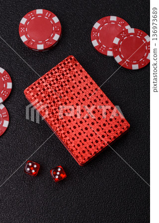 Casino, cards and chips on a colored background, poker and blackjack. Cards and chips Casino, cards and chips on a colored background, poker and blackjack. Cards and chips 136973689