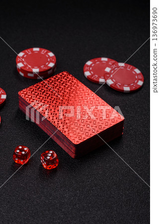 Casino, cards and chips on a colored background, poker and blackjack. Cards and chips Casino, cards and chips on a colored background, poker and blackjack. Cards and chips 136973690