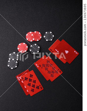 Casino, cards and chips on a colored background, poker and blackjack. Cards and chips 136973695