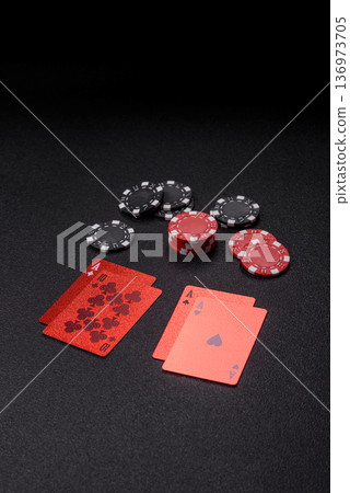 Casino, cards and chips on a colored background, poker and blackjack. Cards and chips Casino, cards and chips on a colored background, poker and blackjack. Cards and chips 136973705