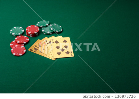Casino, cards and chips on a colored background, poker and blackjack. Cards and chips 136973726
