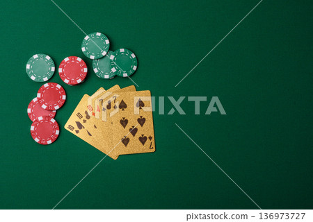 Casino, cards and chips on a colored background, poker and blackjack. Cards and chips Casino, cards and chips on a colored background, poker and blackjack. Cards and chips 136973727