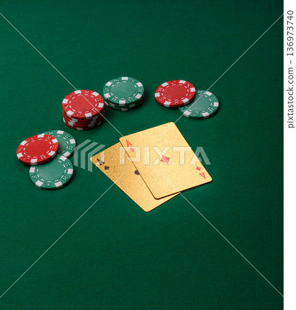 Casino, cards and chips on a colored background, poker and blackjack. Cards and chips Casino, cards and chips on a colored background, poker and blackjack. Cards and chips 136973740