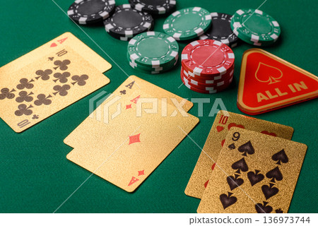Casino, cards and chips on a colored background, poker and blackjack. Cards and chips Casino, cards and chips on a colored background, poker and blackjack. Cards and chips 136973744