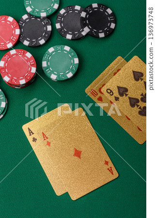 Casino, cards and chips on a colored background, poker and blackjack. Cards and chips Casino, cards and chips on a colored background, poker and blackjack. Cards and chips 136973748