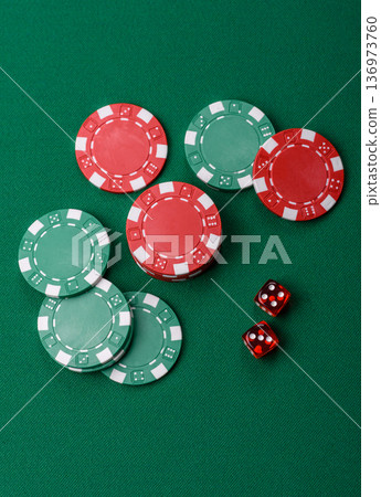 Casino dice and chips on a colored background, poker, gambling with bets. Dice and chips Casino dice and chips on a colored background, poker, gambling with bets. Dice and chips 136973760