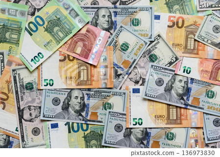 Euro and dollar banknotes, exchange, sales, economic tariffs and taxes. Euros and dollars 136973830