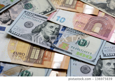 Euro and dollar banknotes, exchange, sales, economic tariffs and taxes. Euros and dollars 136973839